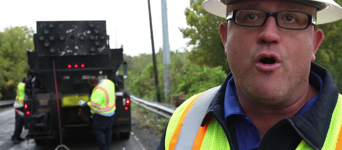 Repairing An Asphalt Bridge Deck With A Fiber-Mat Layer